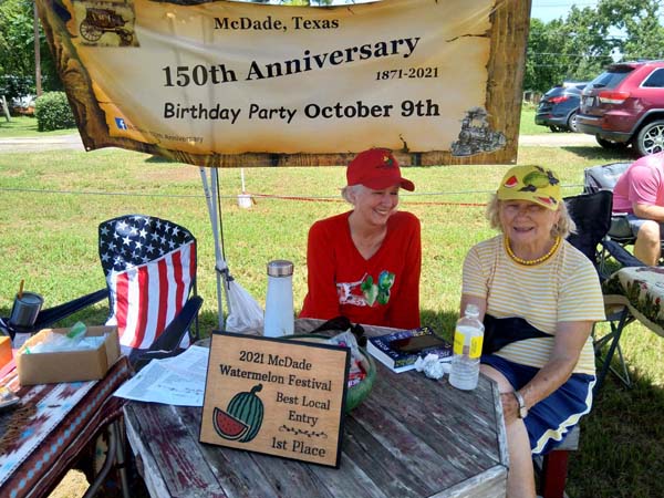 Kathleen Grissom and Margaret Hobbs with parade float winners plaque